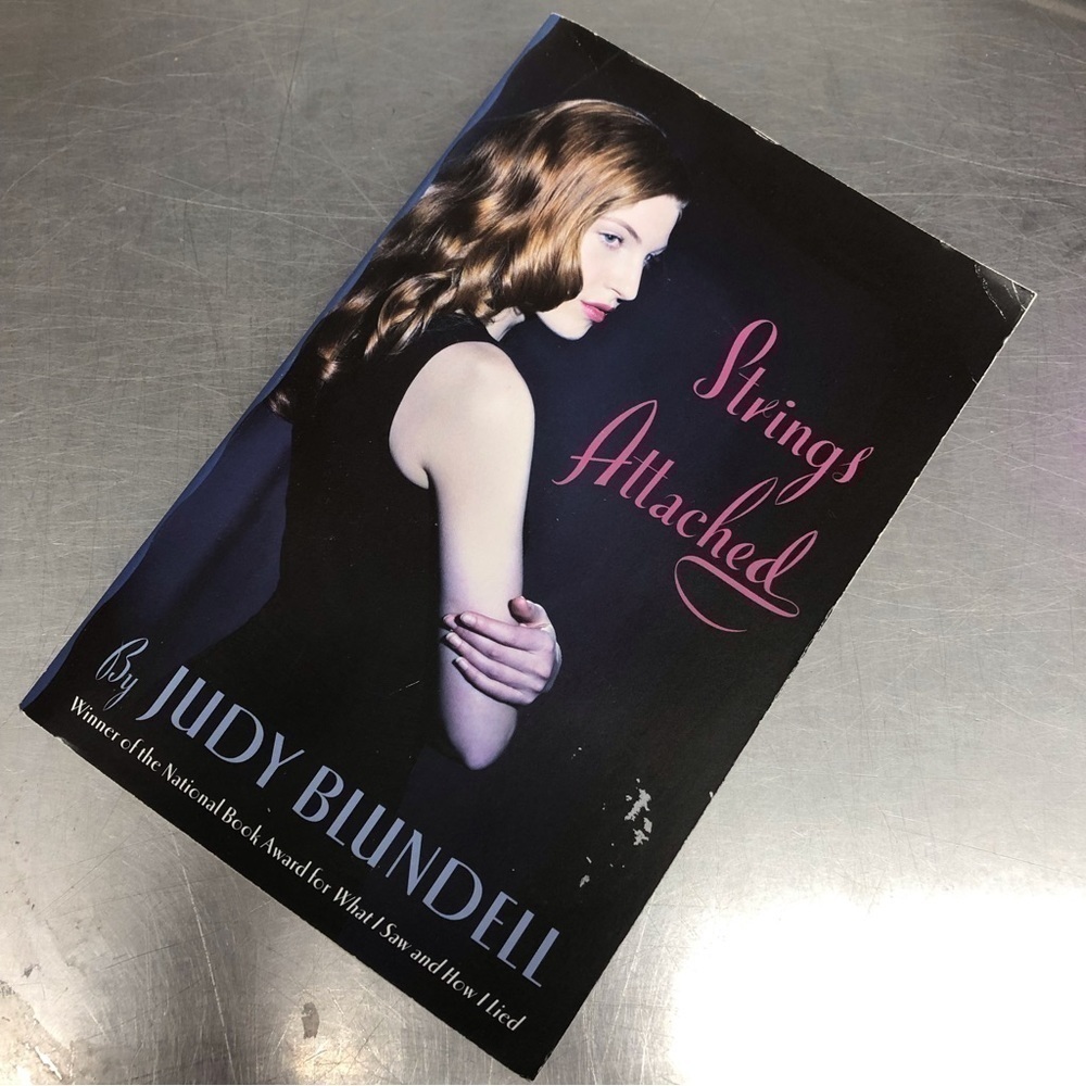Strings Attached by: Judy Blundell, paperback book